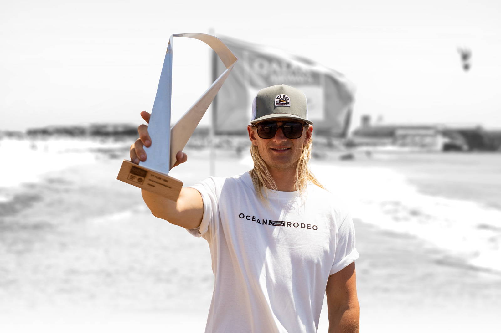 Giel Vlugt with a trophy for kitesurfing - Ocean Rodeo