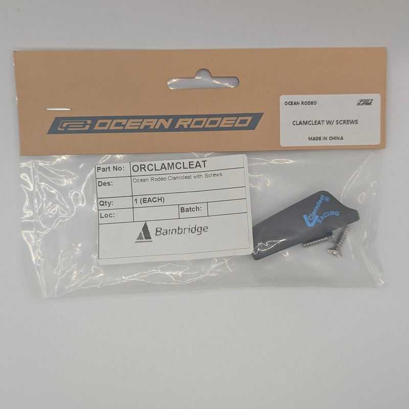 Packaged Ocean Rodeo clamcleat with clear plastic cover on gray background