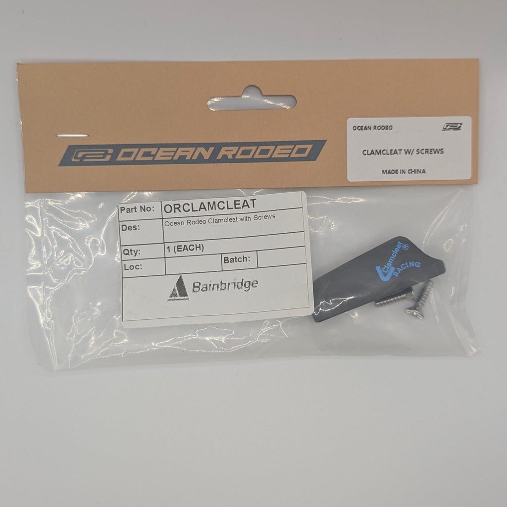 Packaged Ocean Rodeo clamcleat with clear plastic cover on gray background